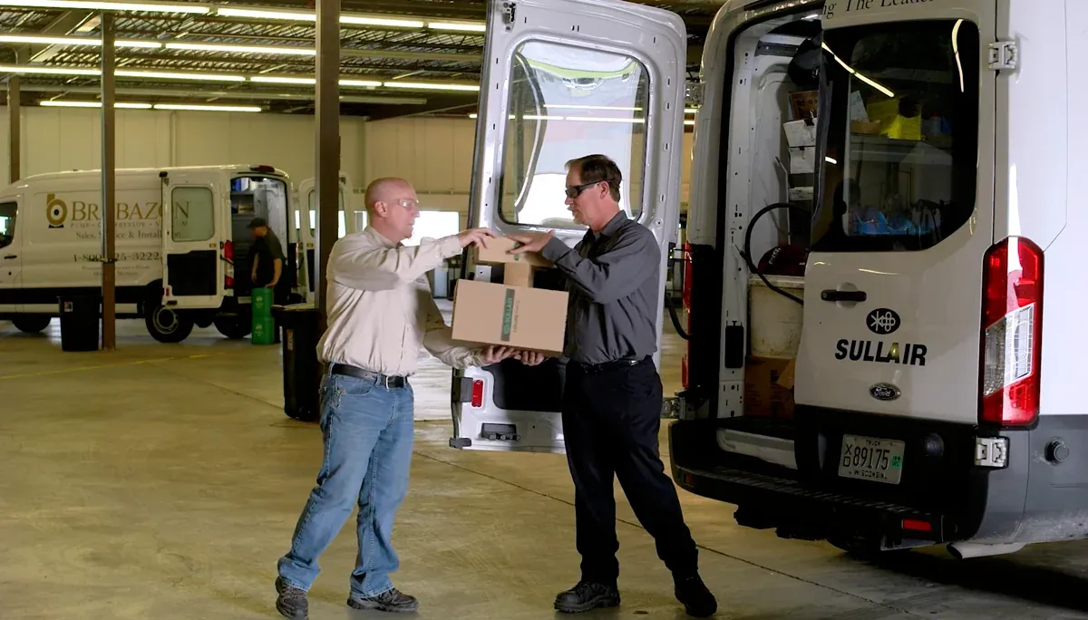 Brabazon team loading Sullair parts into branded service vans