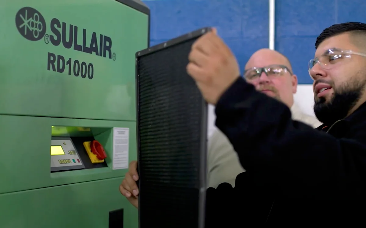 Brabazon technicians replacing the filter panel on a Sullair RD1000 refrigerated air dryer