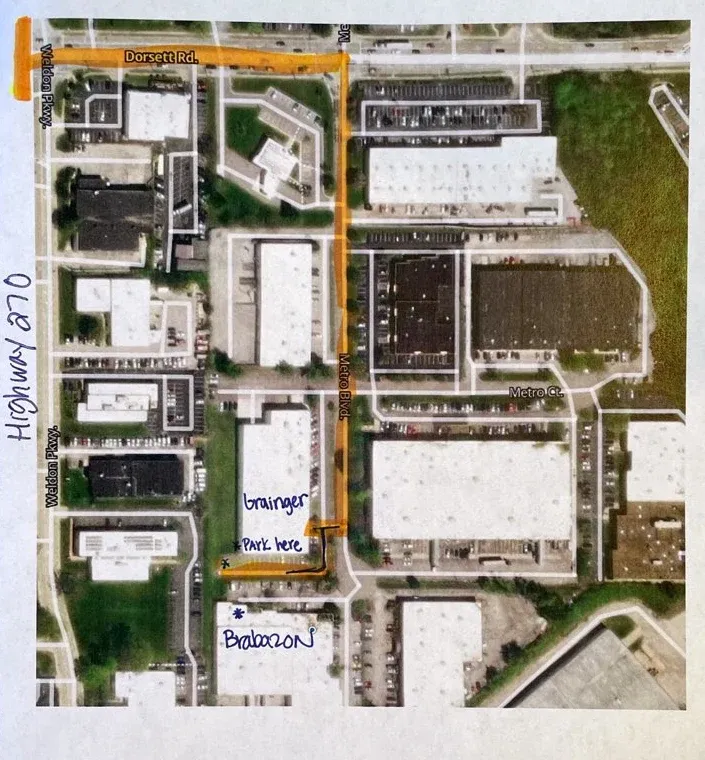 Aerial parking map: from Dorsett Rd take Metro Blvd south, park in the Grainger lot just north of the Brabazon building